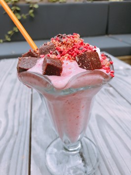 Raspberry Raw Sundae with Brownie Bites, Coconut Cream and Peanut Butter Crumbs